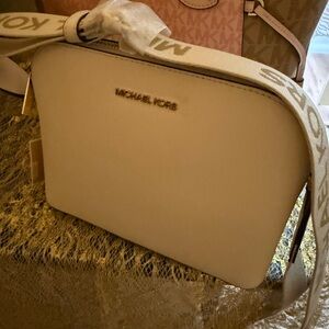 Michael Kors Cream Crossbody Bag with Structured Design